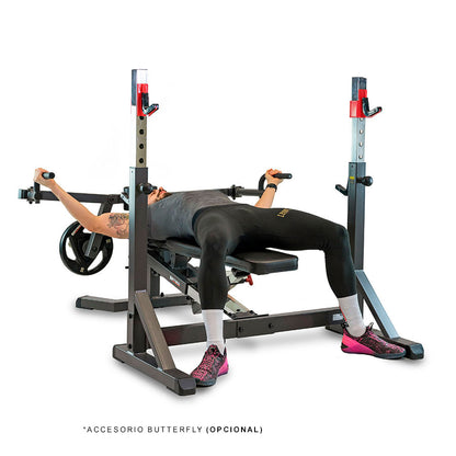Banco Olympic Rack G510 BH Fitness con el accesorio butterfly