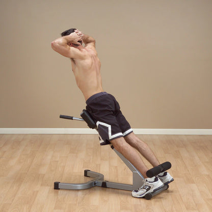 Banco de hiperextension de espalda Powerline 45º de Body-solid, imagen con ejemplos de ejercicios,vista general lateral